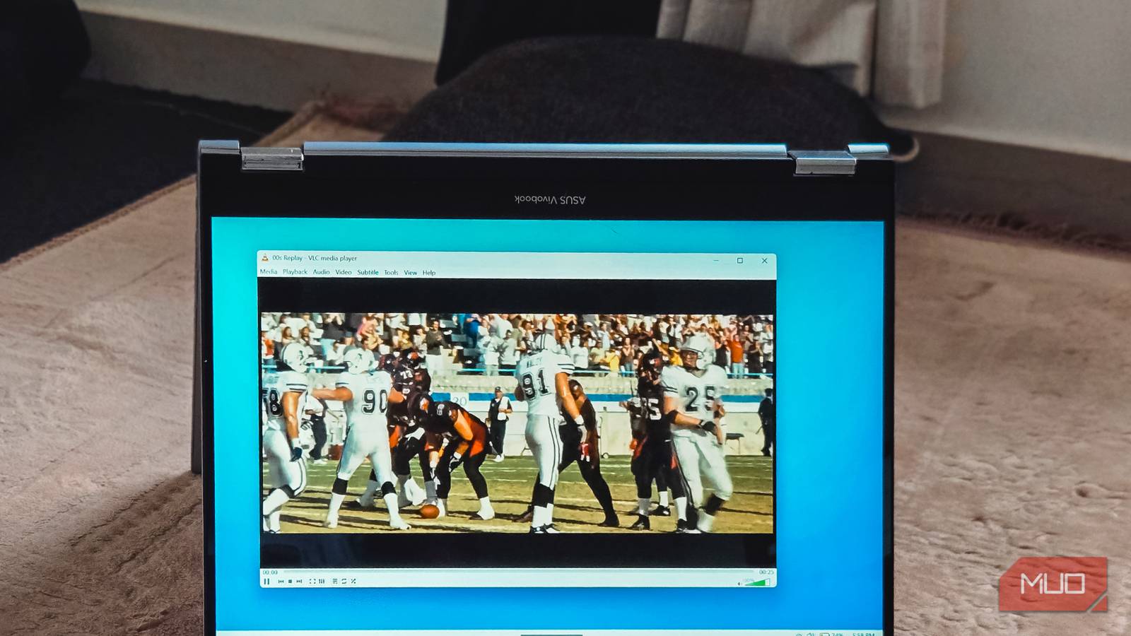 vlc media player streaming football game on asus vivobook s14 flip touchscreen