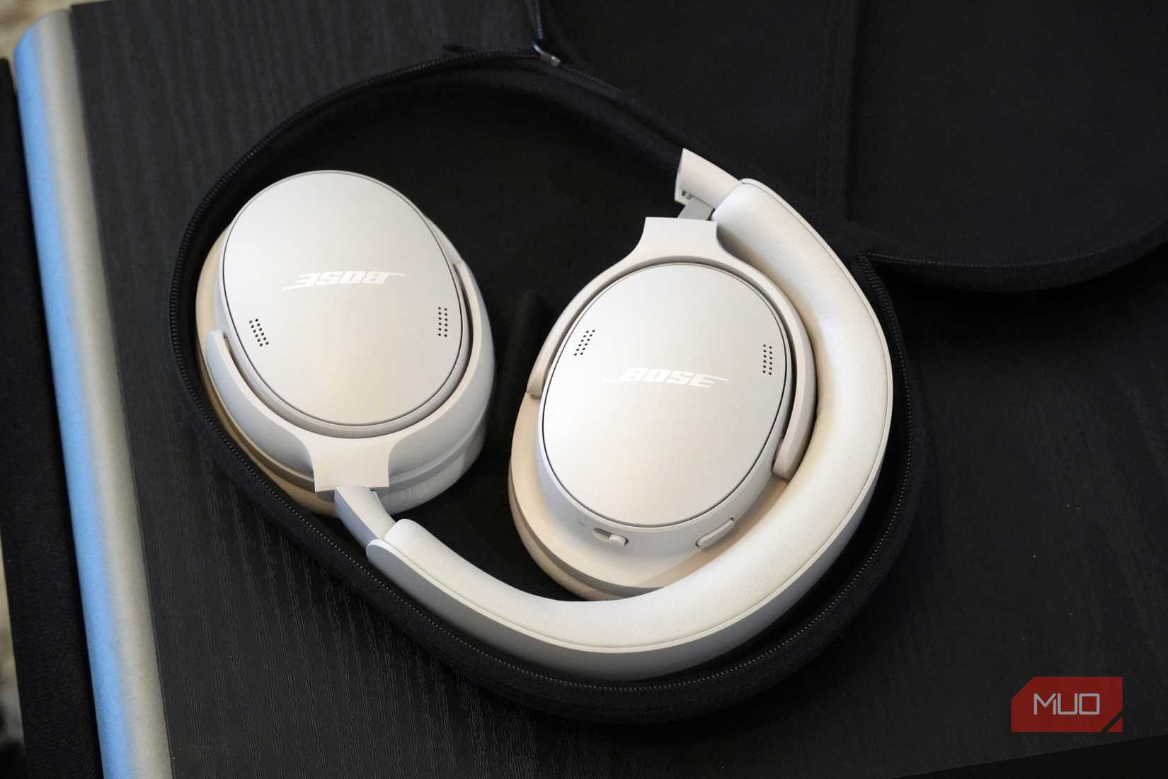 The collapsed Bose QuietComfort 2 headphones in white.
