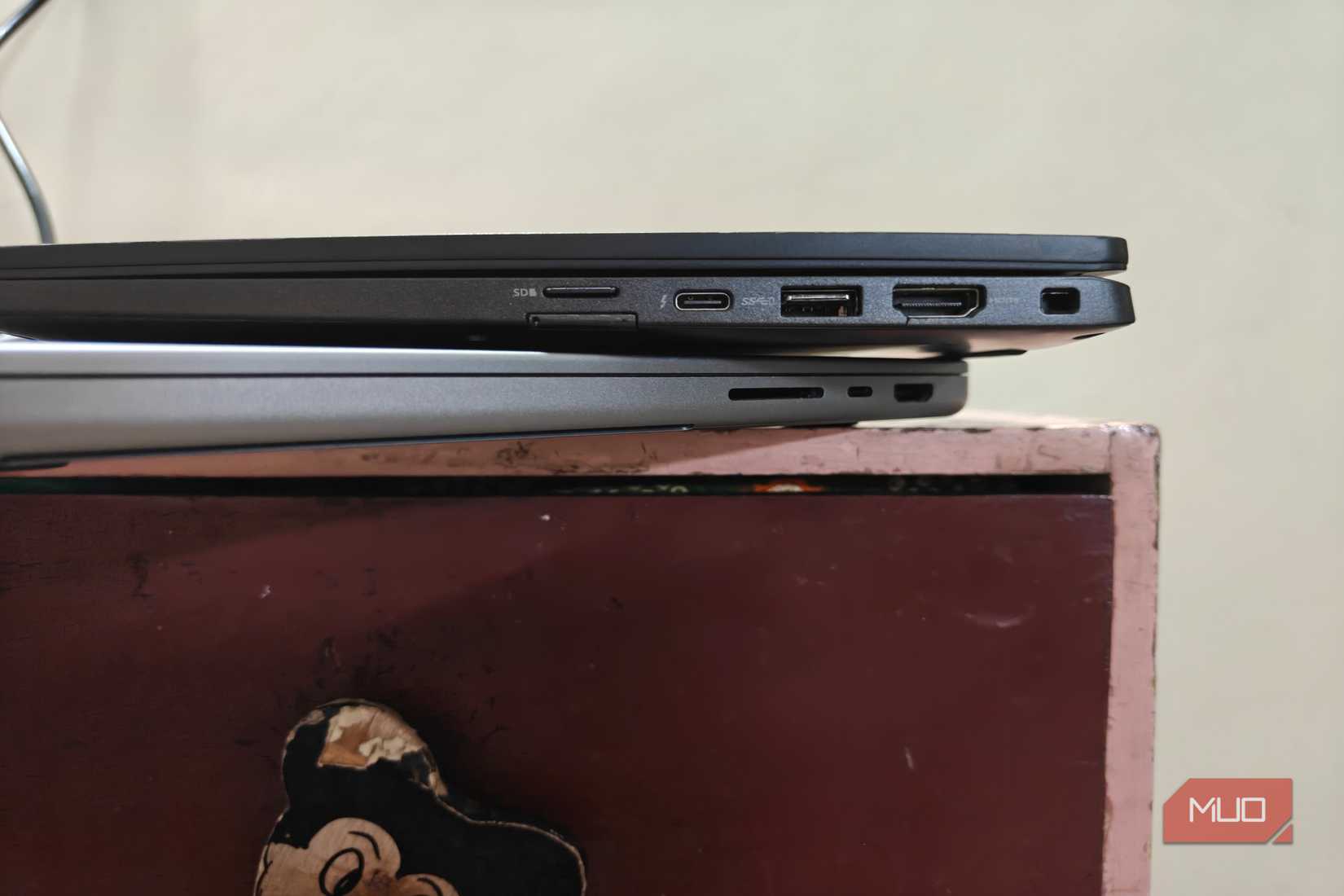 The Dell Latitude and a Macbook Pro