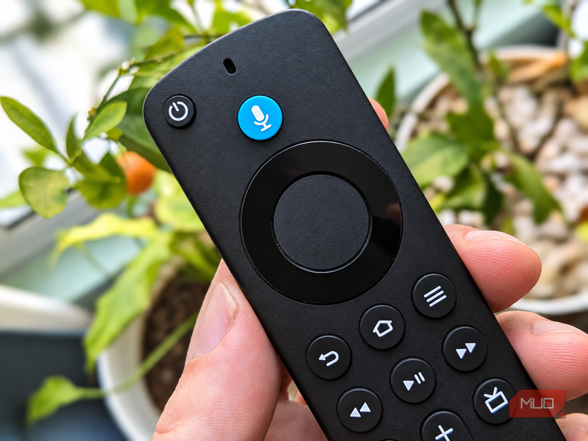 A Fire TV remote with voice commands button.
