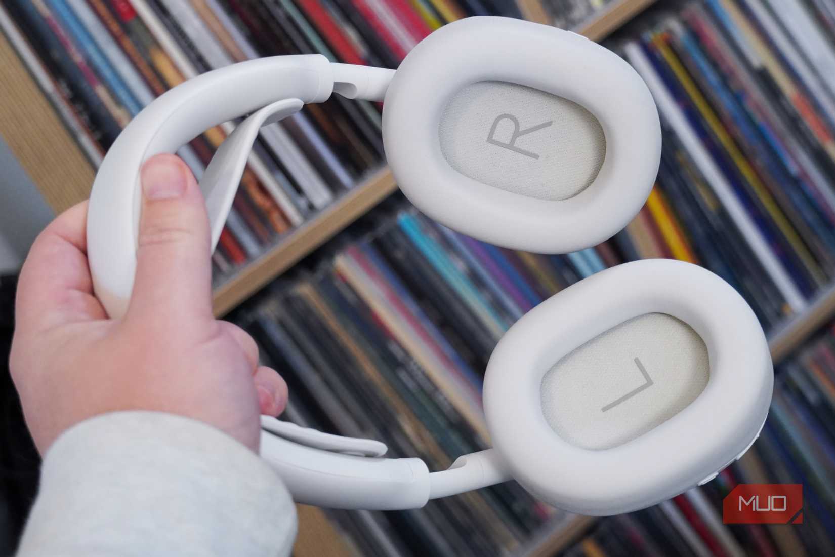 The Logitech Zone Vibe Pro headset in the off-white colorway showing the ear pads.