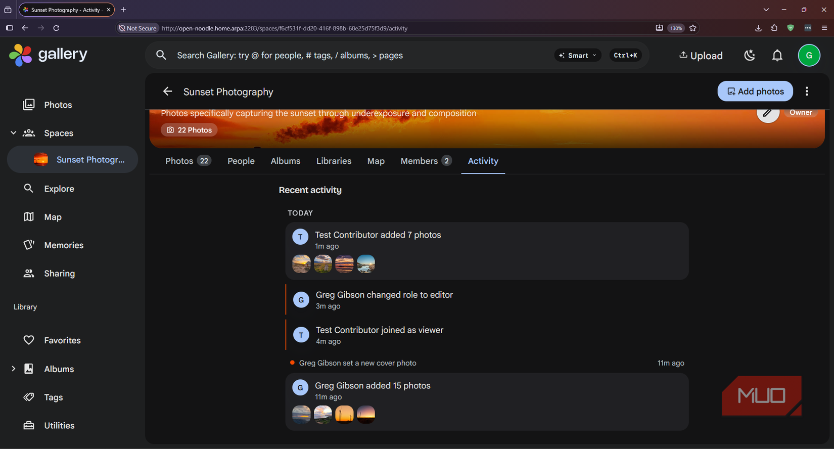 Activity log for the Sunsets Shared Space showing photo contributions from two test accounts