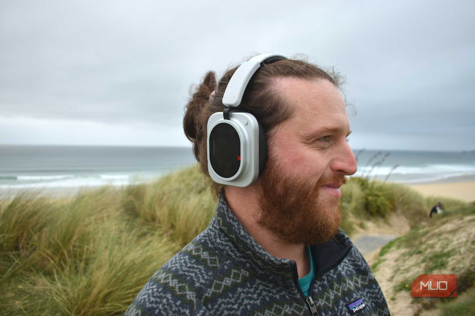 Nothing Headphone (1) Pro man wearing side view.