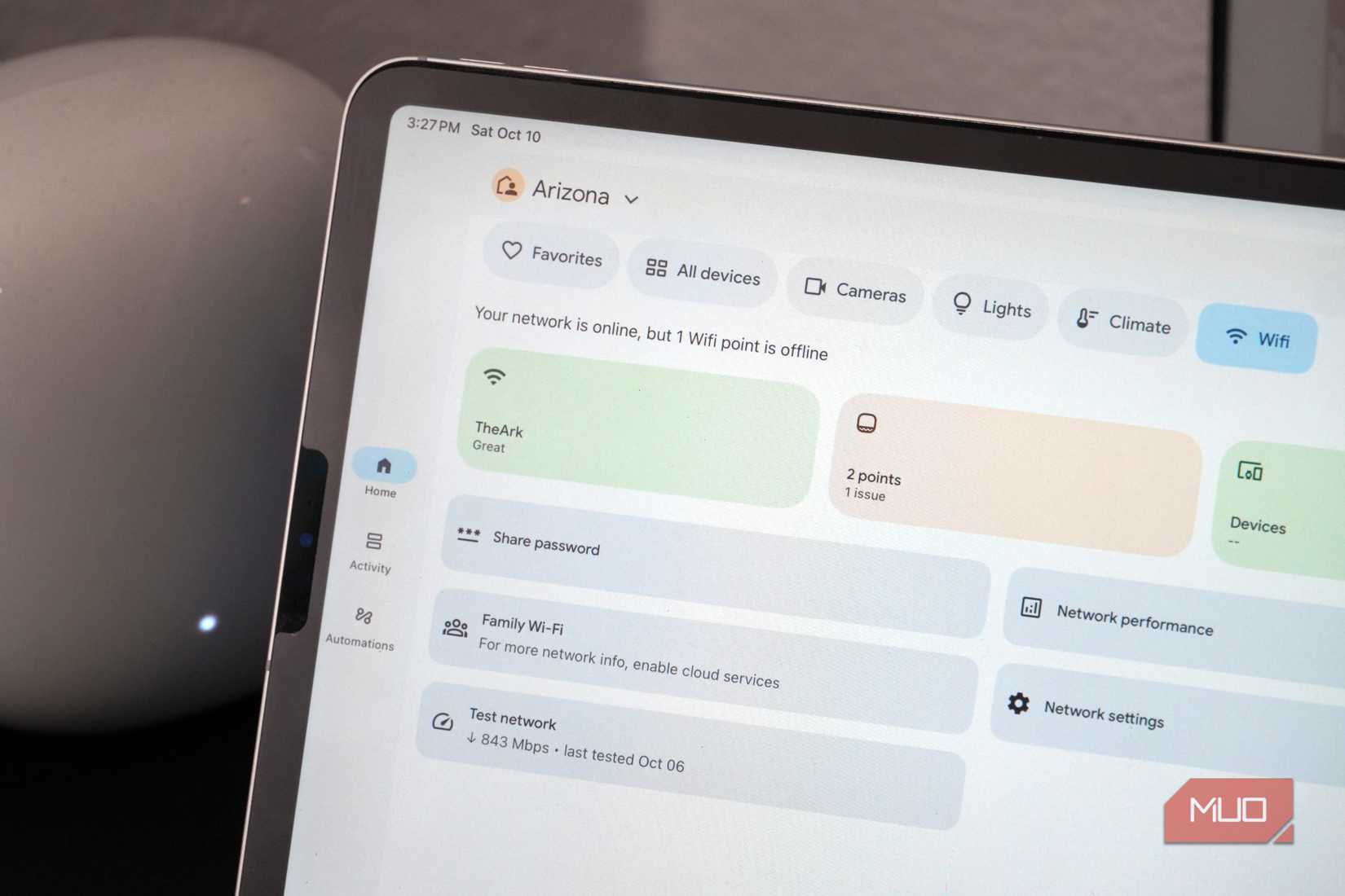 Google Home router info beside a Nest Wi-Fi Pro router.
