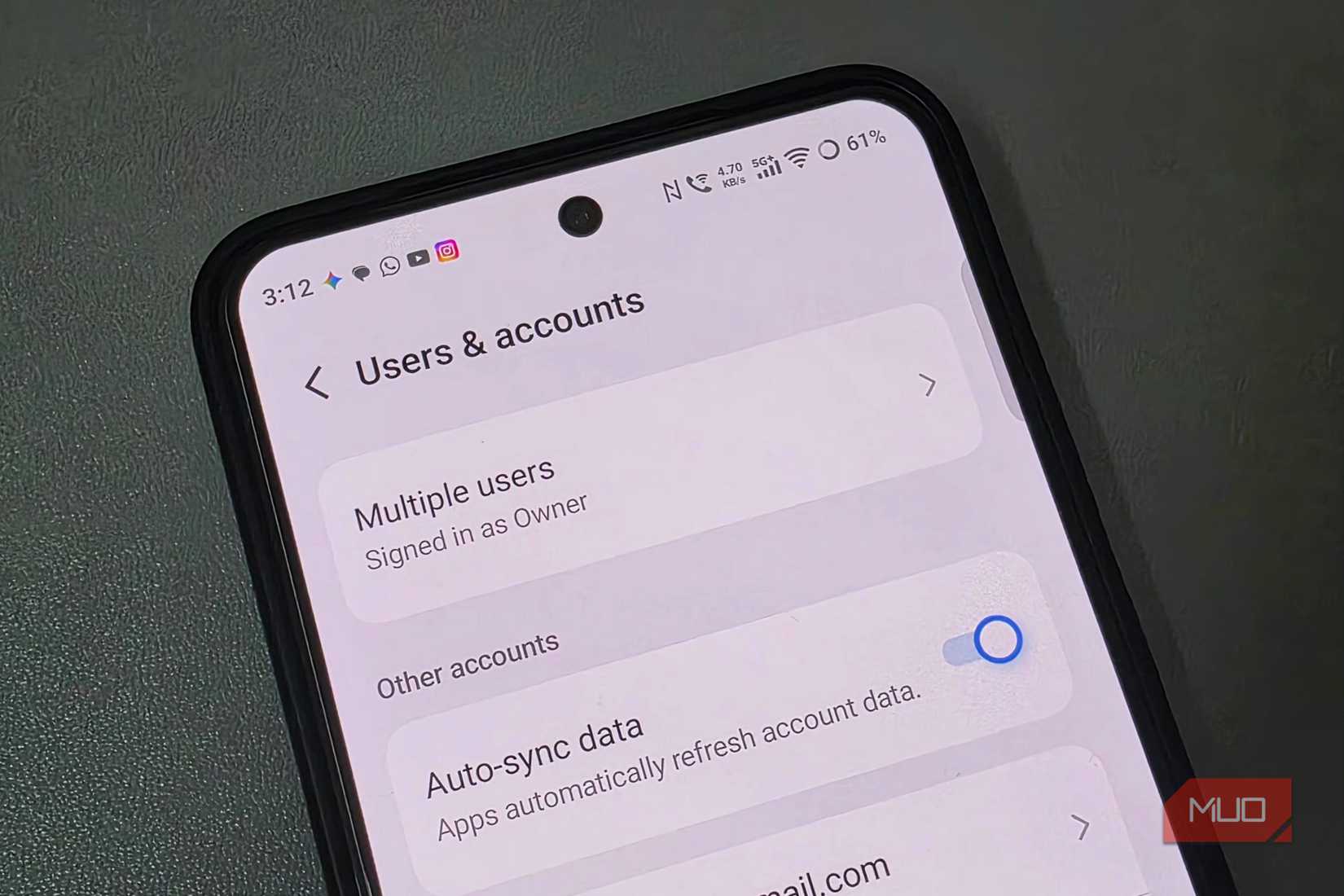 Phone screen showing auto sync data toggle