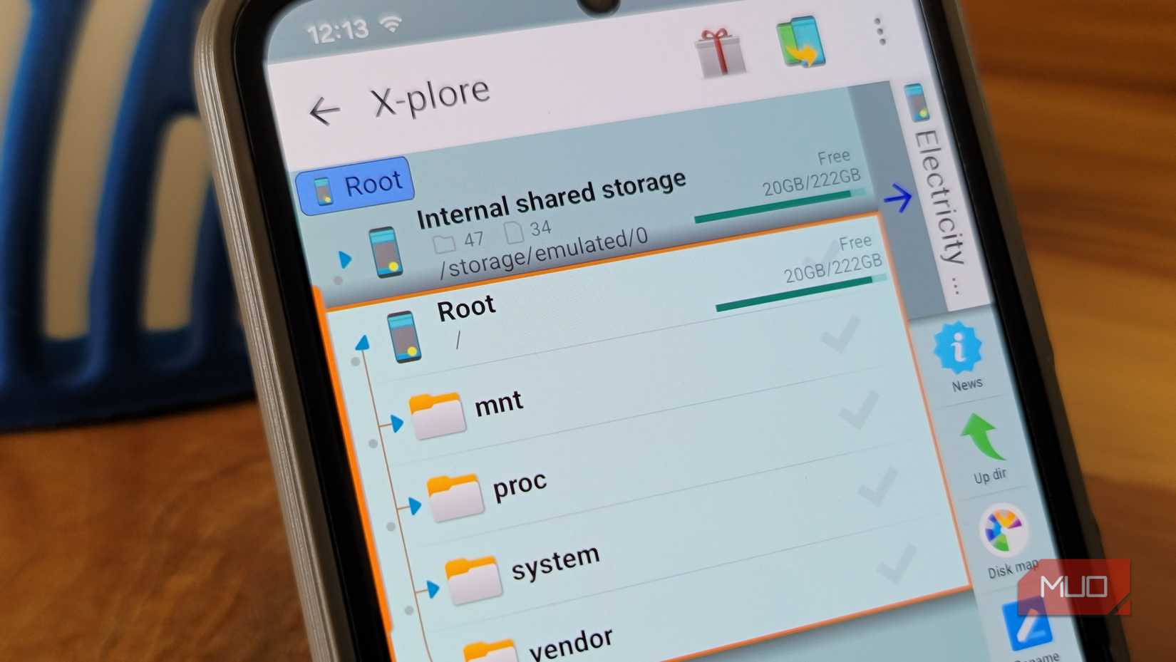 phone screen showing x plore file manager root directory browsing