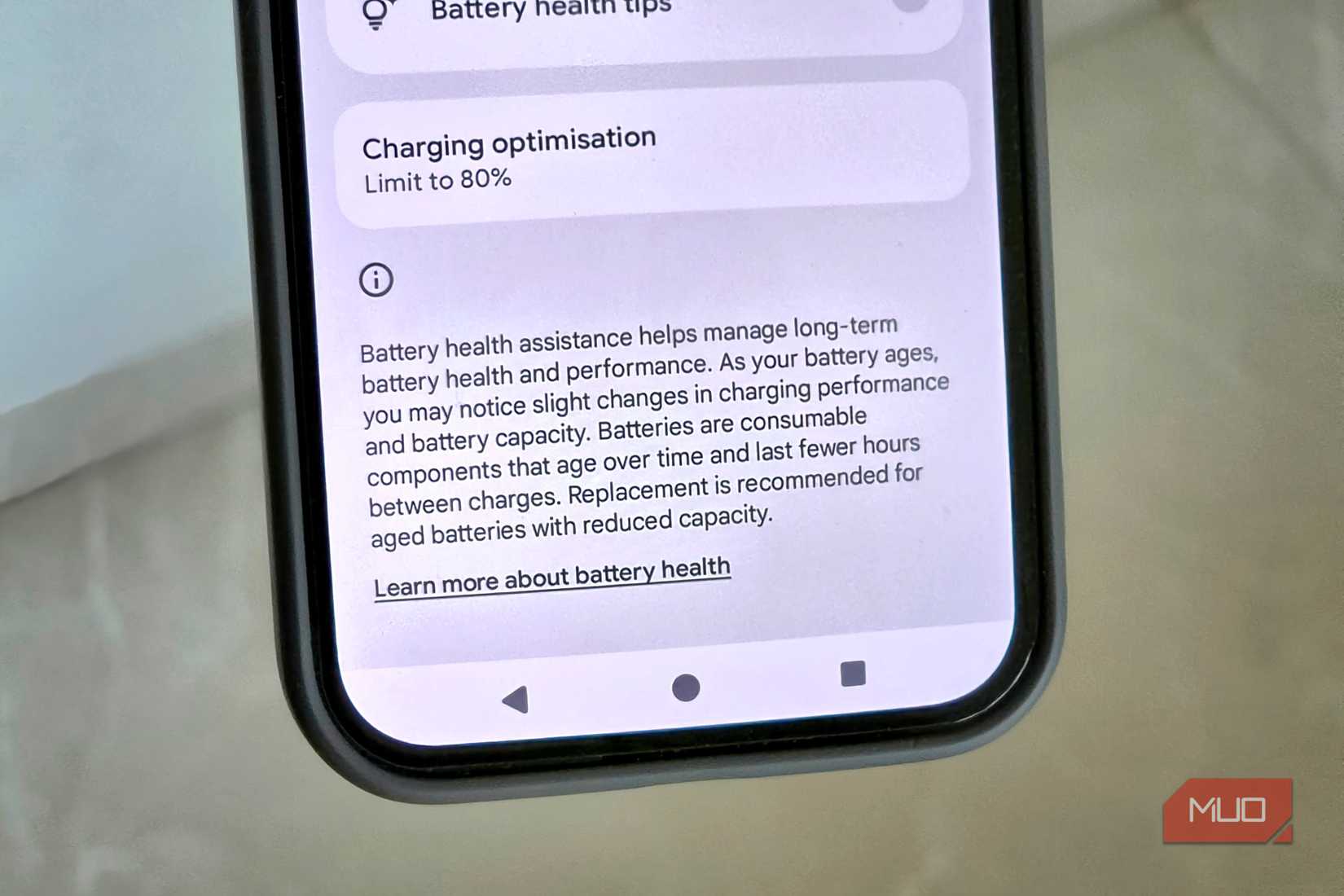 Pixel in hand showing battery health assistance feature