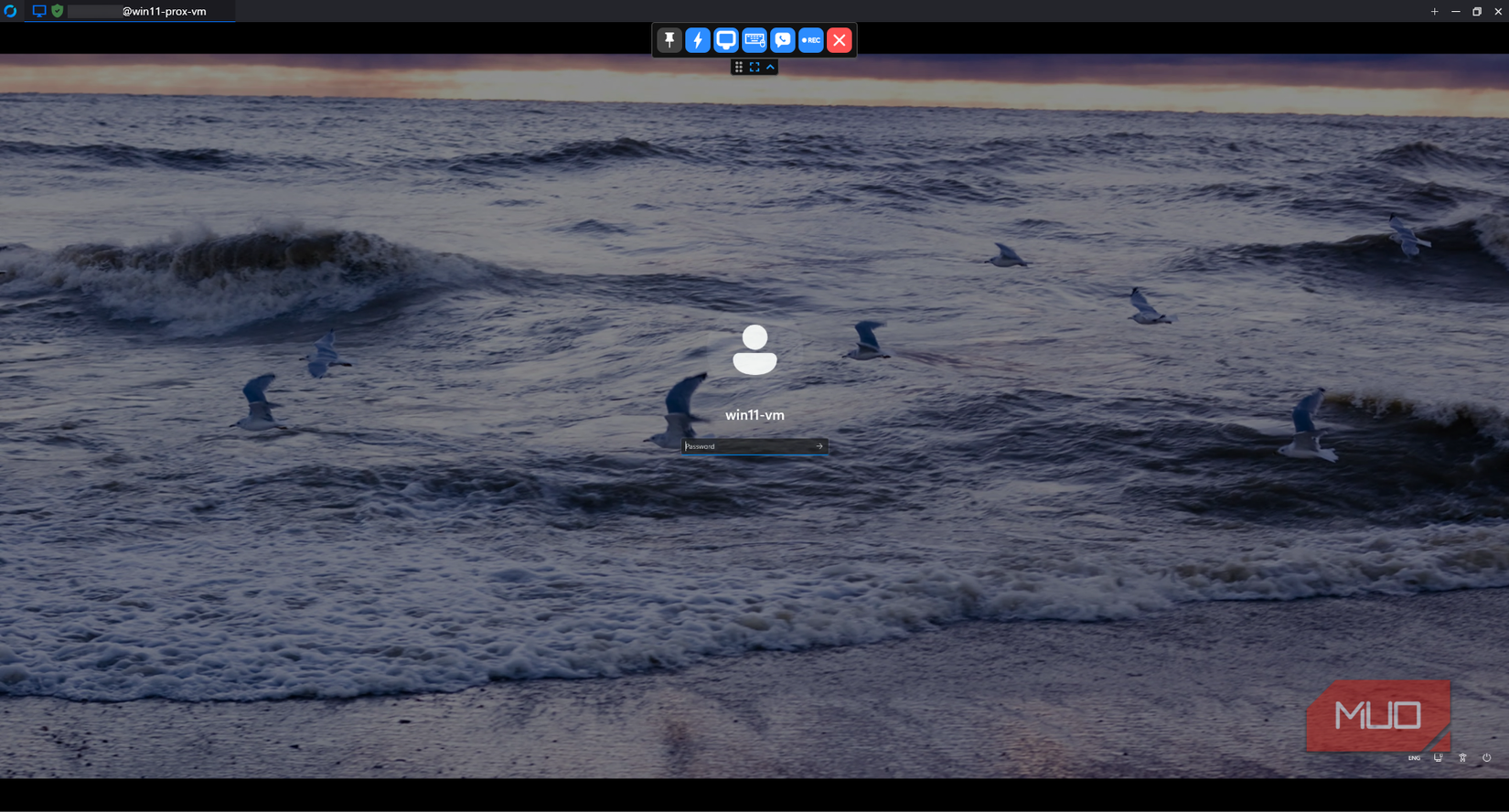 Windows 11 sign-in screen displayed through RustDesk after a restart, with the remote-session toolbar visible