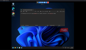 RustDesk displaying a remote Windows 11 desktop with Notepad open and the session toolbar visible