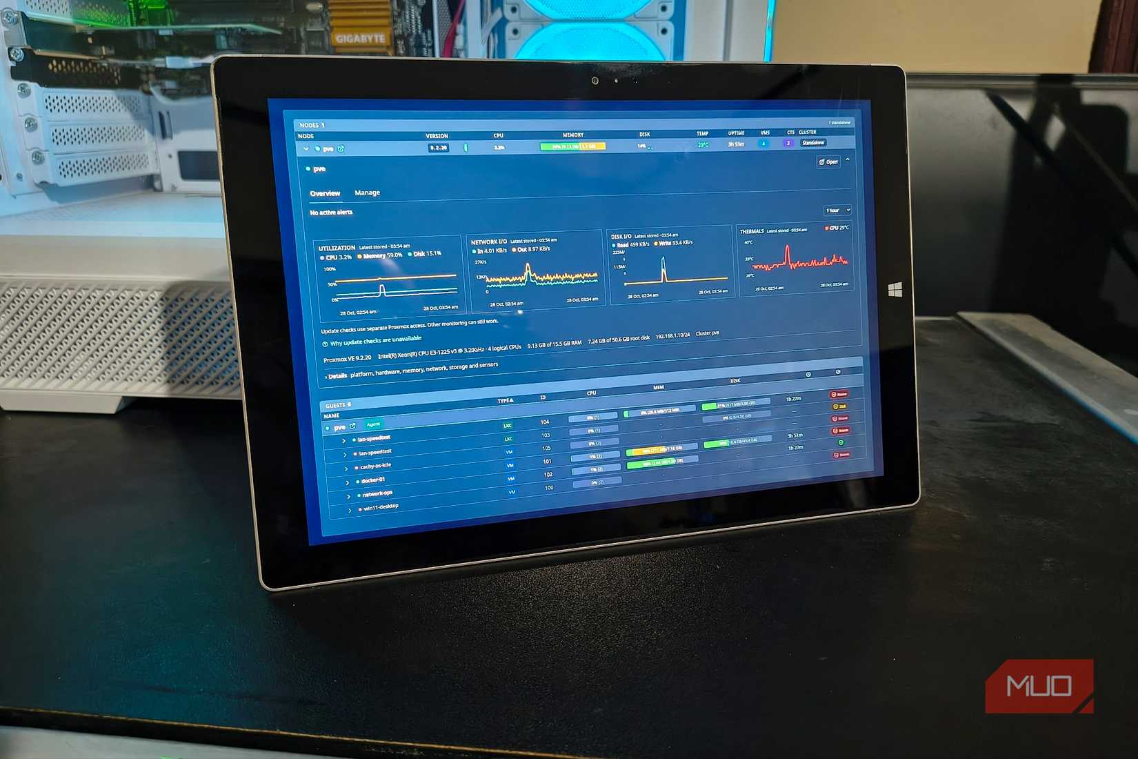 My Surface Pro 3 displaying Pulse fullscreen on the desk, with resource graphs and the VM list visible