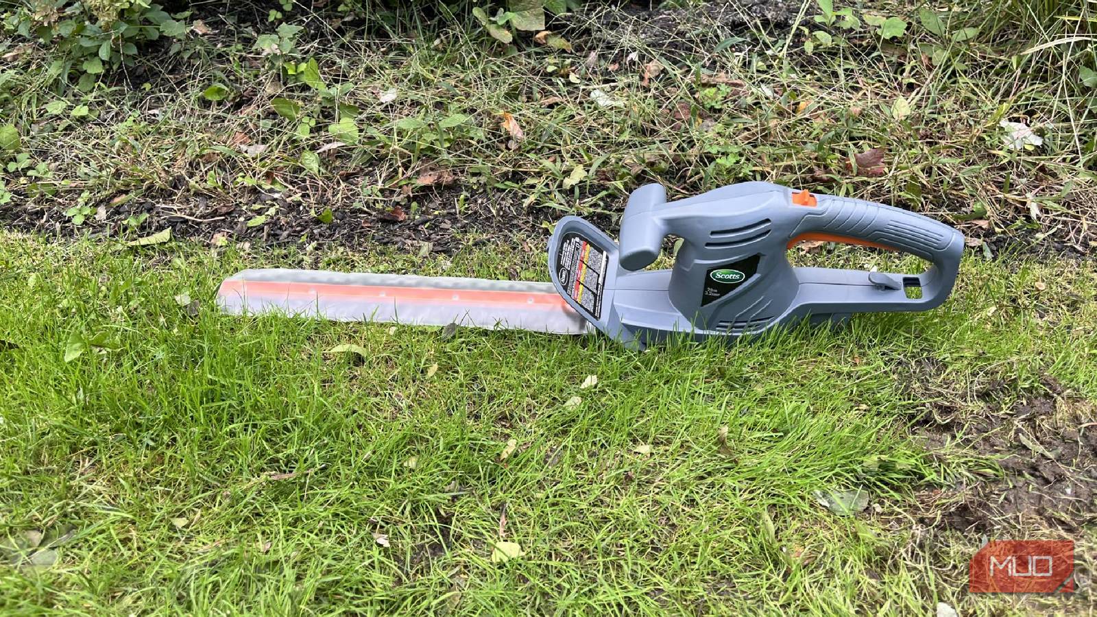 A Scotts Corded Hedge Trimmer with grass