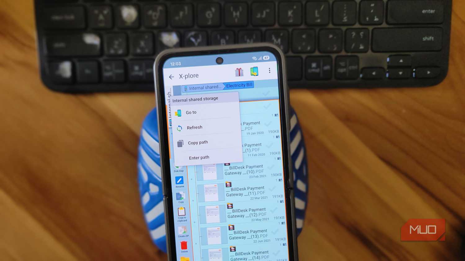 x plore file manager showing billdesk payment gateway pdfs in electricity bill folder on phone